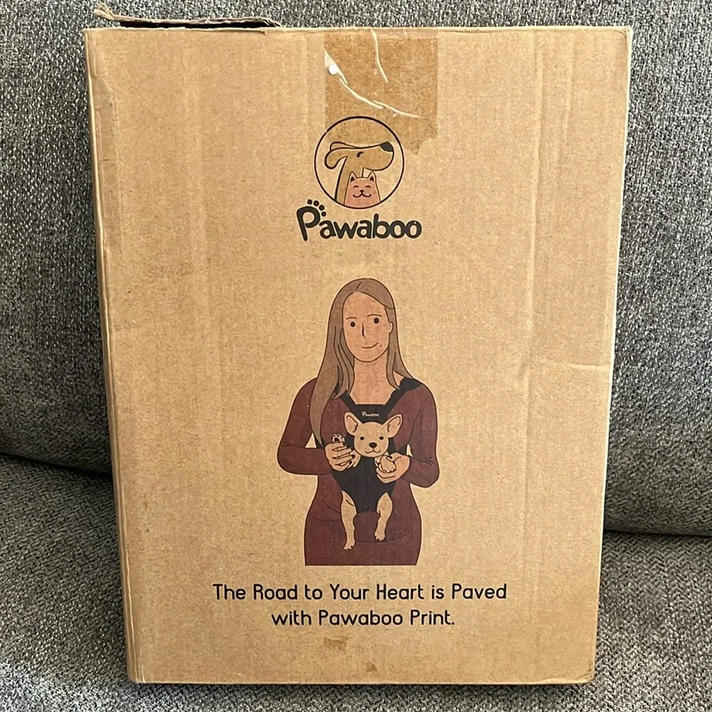 New in box adjustable front pet carrier.